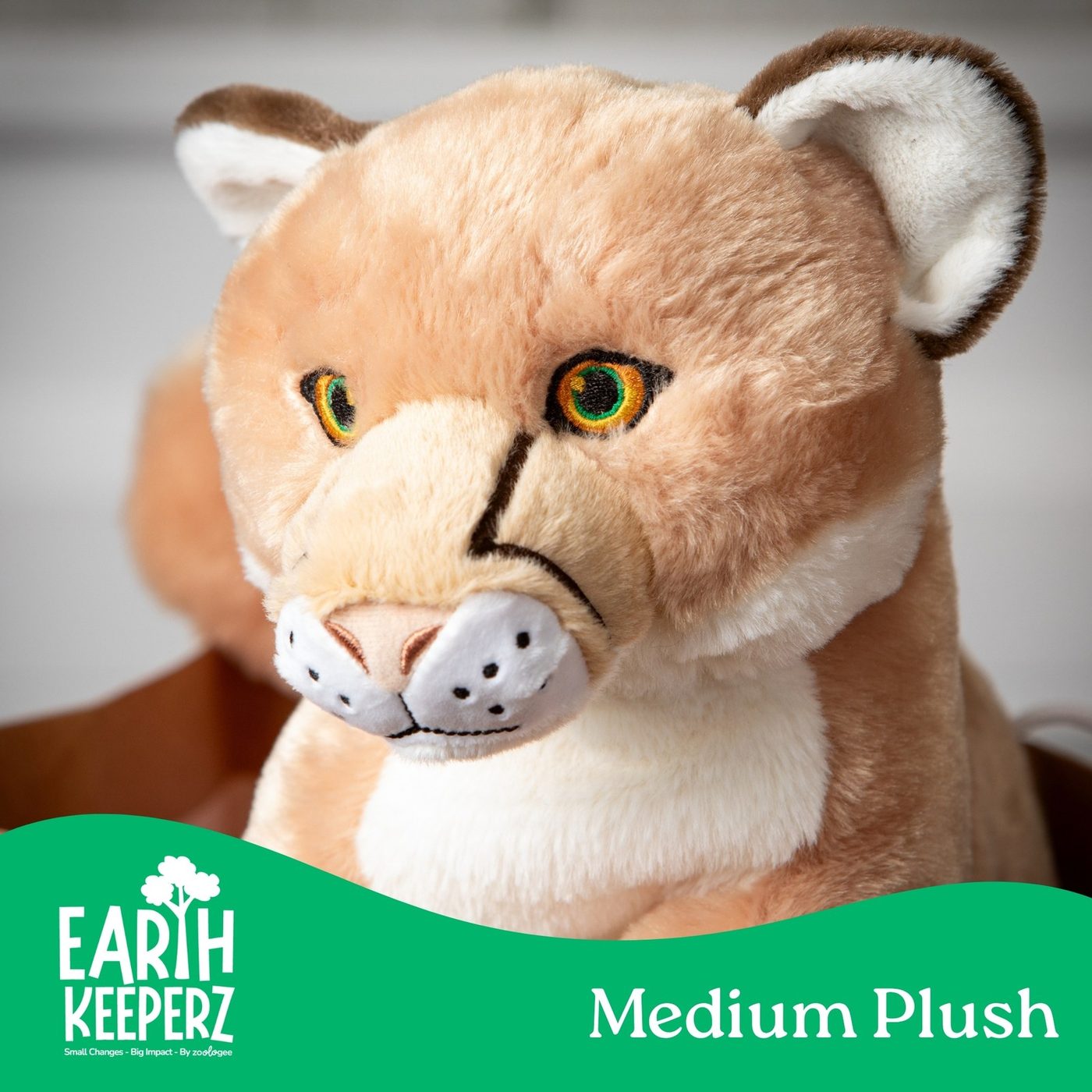 An Earth Keeperz medium cougar plush toy